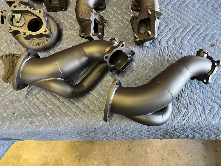 Bronze-gray coated exhaust pipes