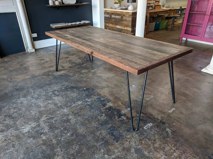 Wood dining table on black hairpin legs