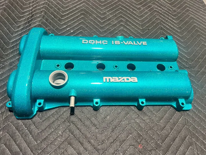 Teal Mazda DOHC 16-valve cover