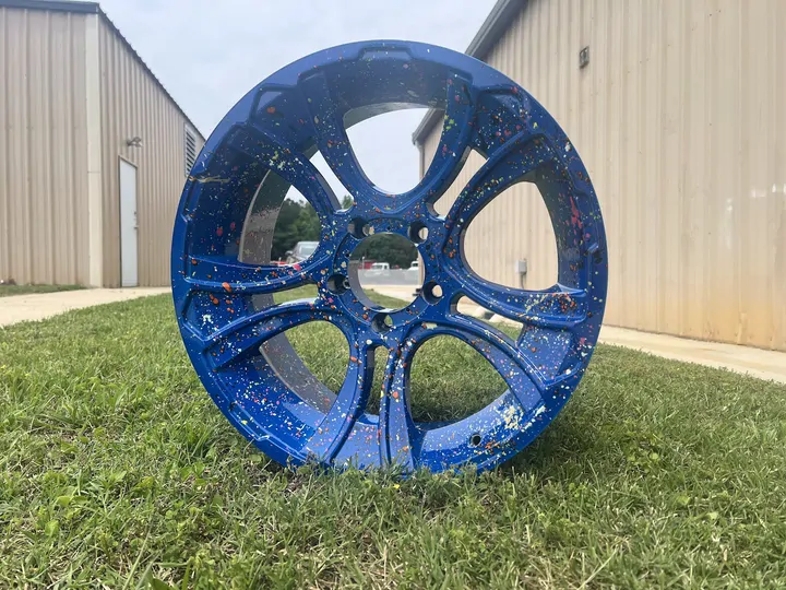 Wheel coated in speckled blue