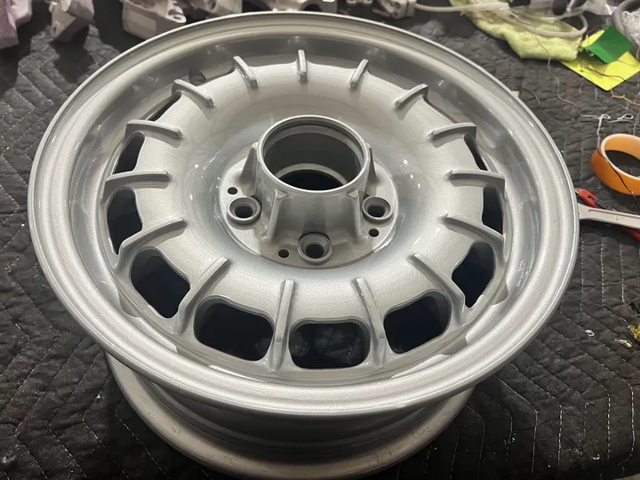 Vintage-style wheel refinished in silver